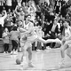 Burke, No. 11, celebrates while a player at Providence. Photo courtesy of Providence.
